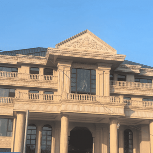 清远黄金麻别墅外墙干挂石材效果示例